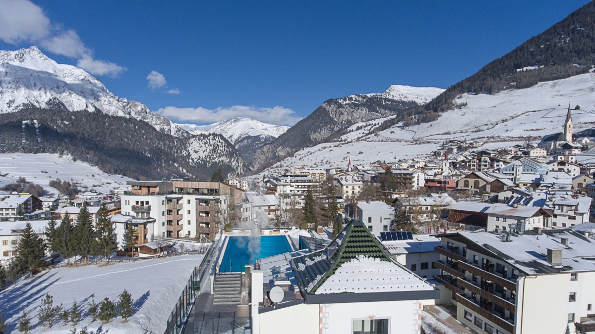 Foto des Almhofs im Winter