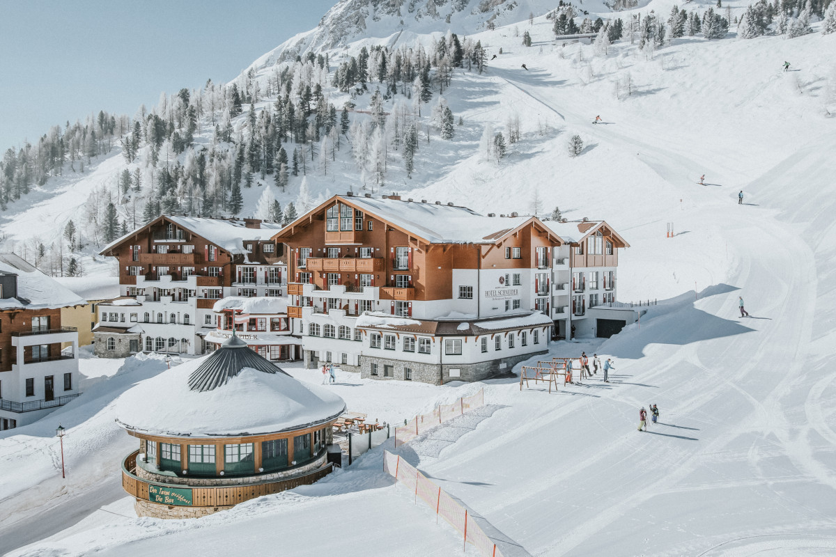 Hotel Schneider Exterior view of Hotel Schneider in Obertauern in winter